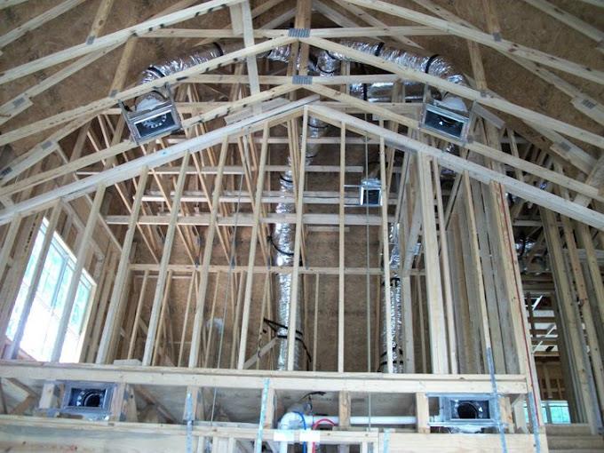 Commercial HVAC ductwork installation in a building under construction
